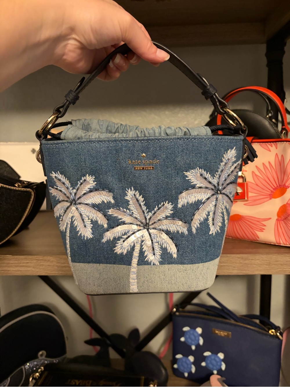 kate spade blue denim bucket bag with white palm embroidery